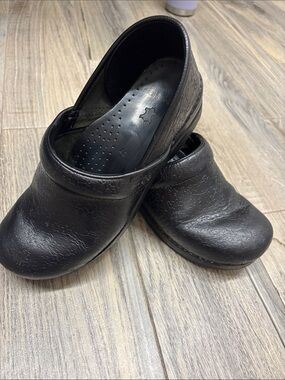 Dansko Black Embossed Leather Clogs